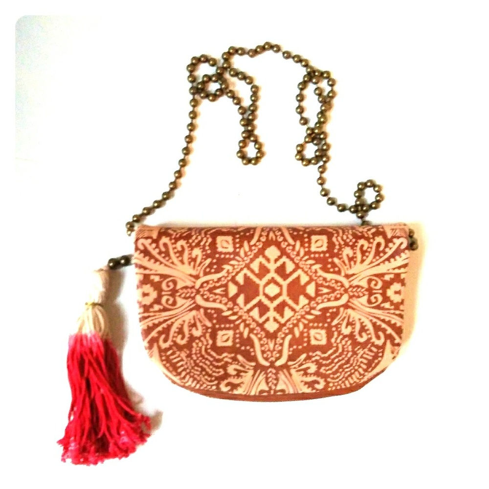 Handbag with chain strap.
